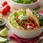 Taco Bowl Recipe: 5 Easy Steps to a Flavor-Packed Meal 8 A taco bowl filled with fresh vegetables, guacamole, and seasoned meat