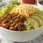 Big Mac Bowl Recipe: A Low-Carb Twist on the Fast Food Classic in 5 Steps 7 Low-carb Big Mac bowl recipe with ground beef, lettuce, cheese, pickles, and special sauce