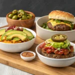 Burger Bowl Recipe: 6 Irresistible Steps to a Low-Carb, High-Flavor Meal 7 Three variations of burger bowls including keto with avocado, spicy with jalapeños, and classic with cheese and pickles, served in separate bowls with decorative toppings.